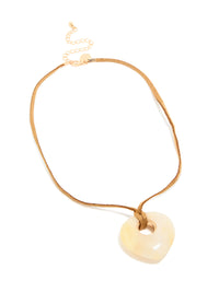 Cream Stone Pendant Brown Cord Necklace - link has visual effect only