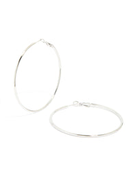 Showcasing waterproof stainless steel hoop earrings in silver, 55 MM front view - link has visual effect only