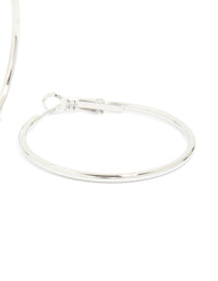 Highlighting waterproof stainless steel hoop earrings in silver post detail view - link has visual effect only