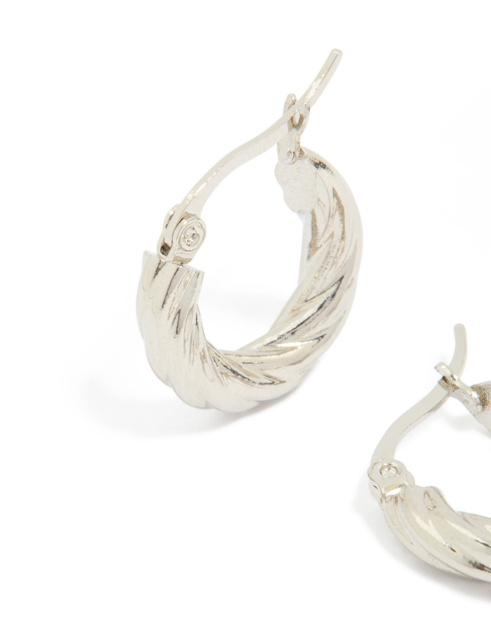 Crafted from waterproof stainless steel twisted hoop earrings in silver post detail view