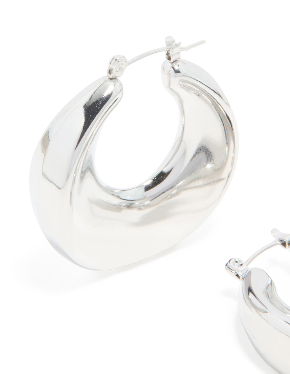 Showcasing waterproof stainless steel large hoop earrings in silver close up view