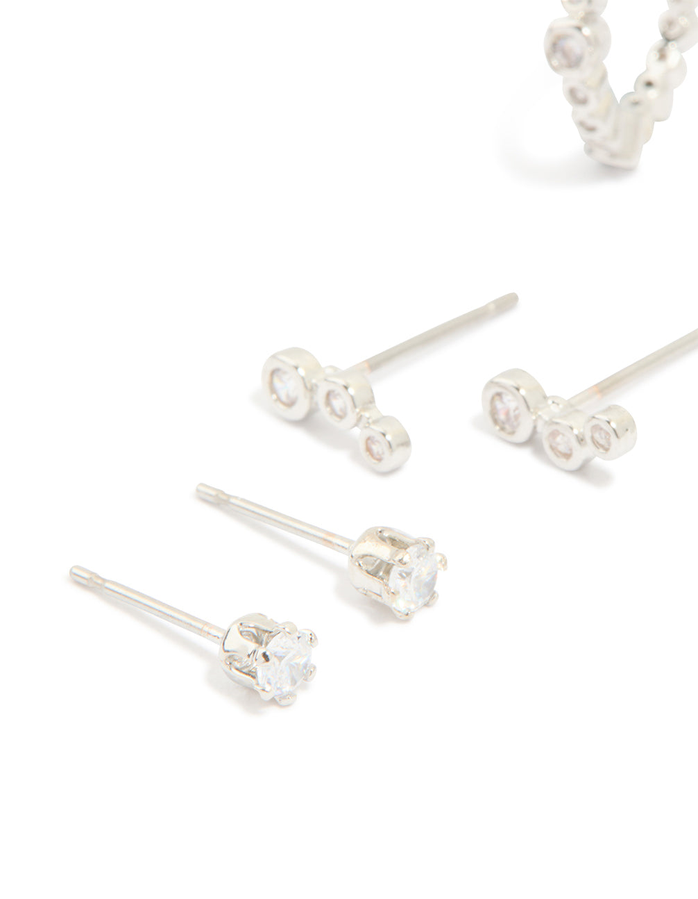 Explore waterproof stainless steel diamante stacking earrings in a 4-pack featuring silver tone close up view