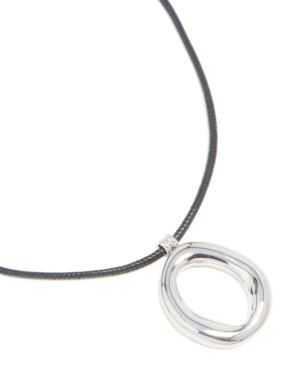 Featuring a waterproof organic pendant necklace crafted from stainless steel on a black cord close up view