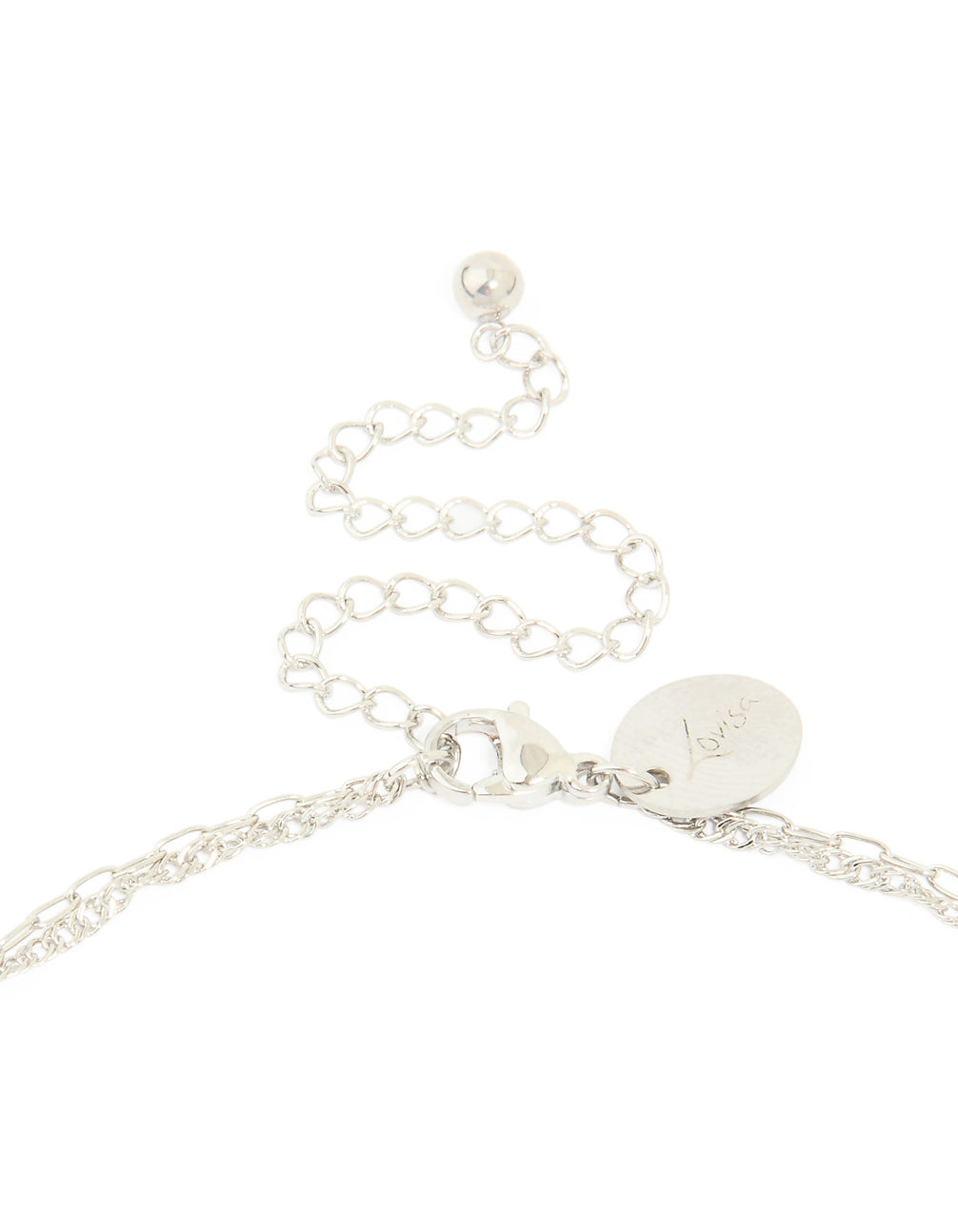 Highlighting the clasp detail of a waterproof stainless steel layered necklace with charm & molting pendants and ivory pearls clasp detail view