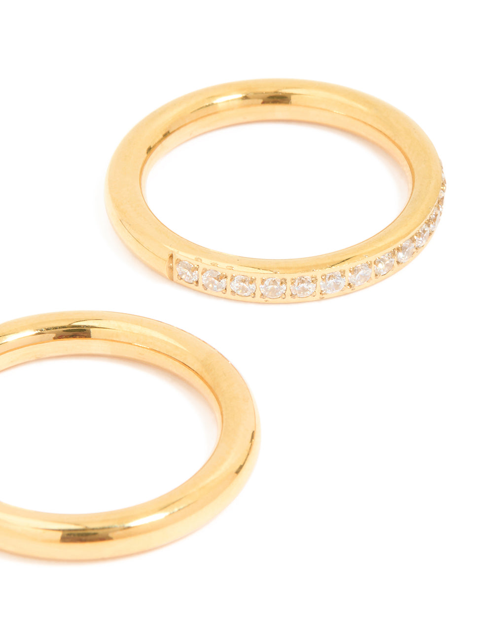 Highlighting waterproof gold plated stainless steel cubic zirconia band and smooth rings in a 3-pack with statement style side detail view
