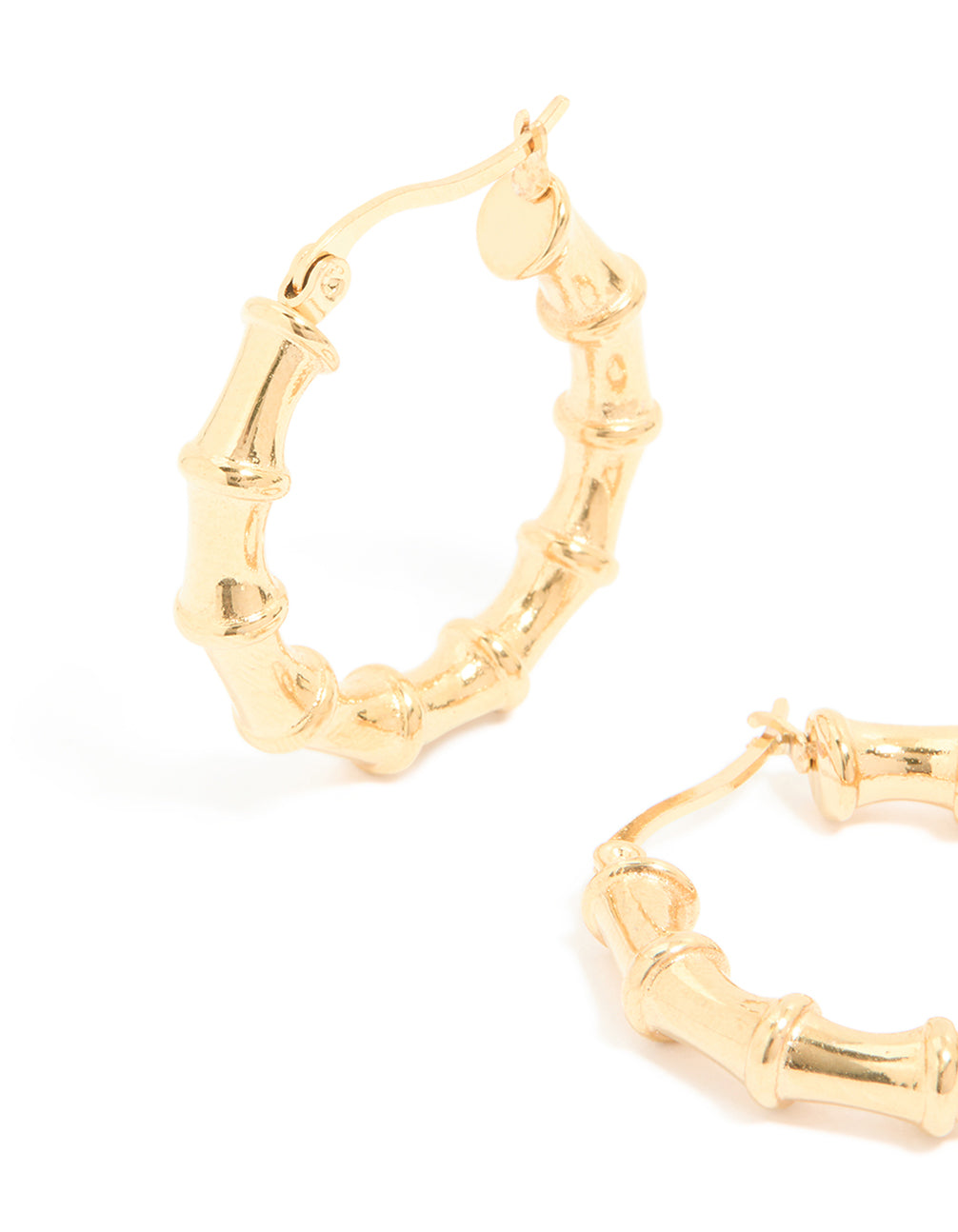 Highlighting waterproof statement hoop earrings crafted from gold plated stainless steel with textured bamboo design close up view