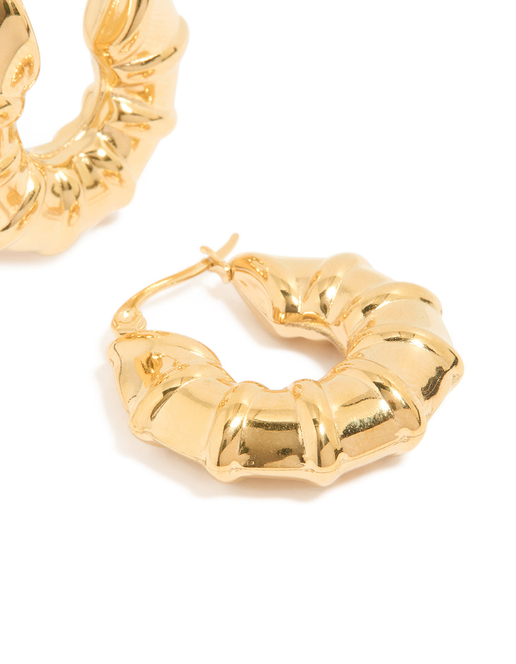 Showcasing waterproof gold plated stainless steel barrel detail hoop earrings post detail view