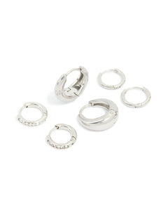 Presenting a waterproof stainless steel cubic zirconia mix huggie earrings 3-pack with silver finish and clear tones front view