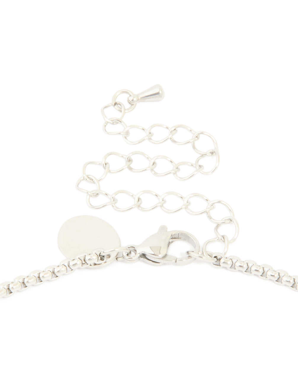 Presenting waterproof stainless steel pavé cubic zirconia cross necklace in silver clasp detail view
