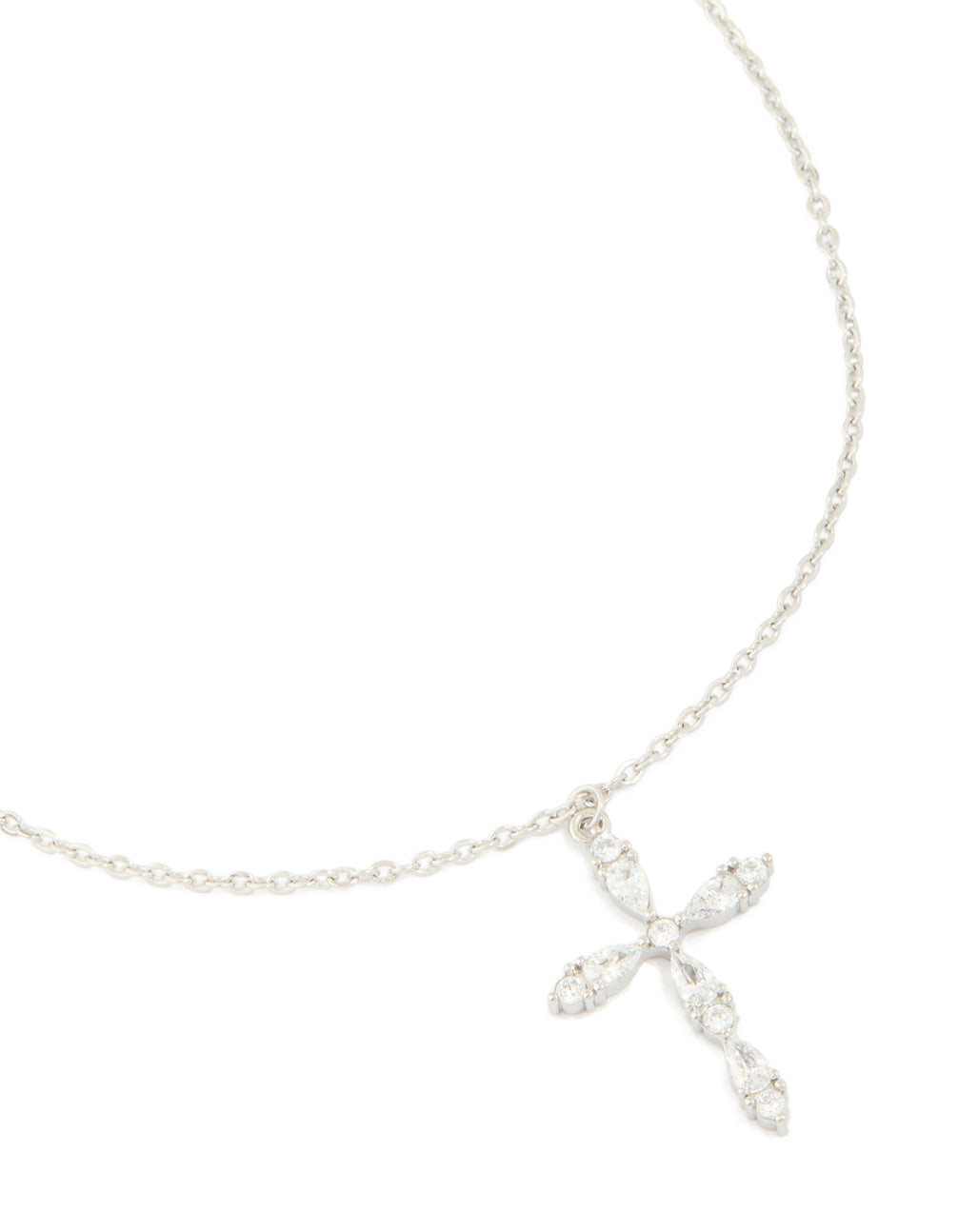 Showcasing a waterproof stainless steel multi cubic zirconia large cross necklace with statement styling in silver and clear close up view