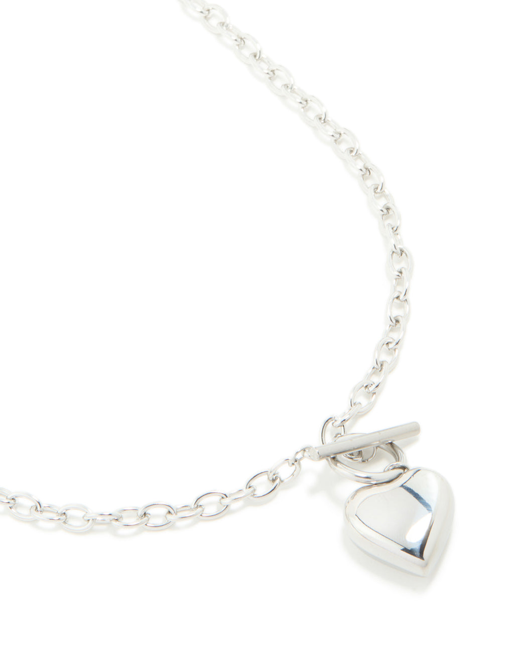 Detailed view of waterproof stainless steel chunky heart T & O necklace in silver finish close up view
