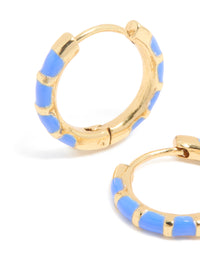 Highlighting the intricate bamboo texture and blue enamel detailing on waterproof statement huggie earrings crafted from gold plated stainless steel close up view - link has visual effect only