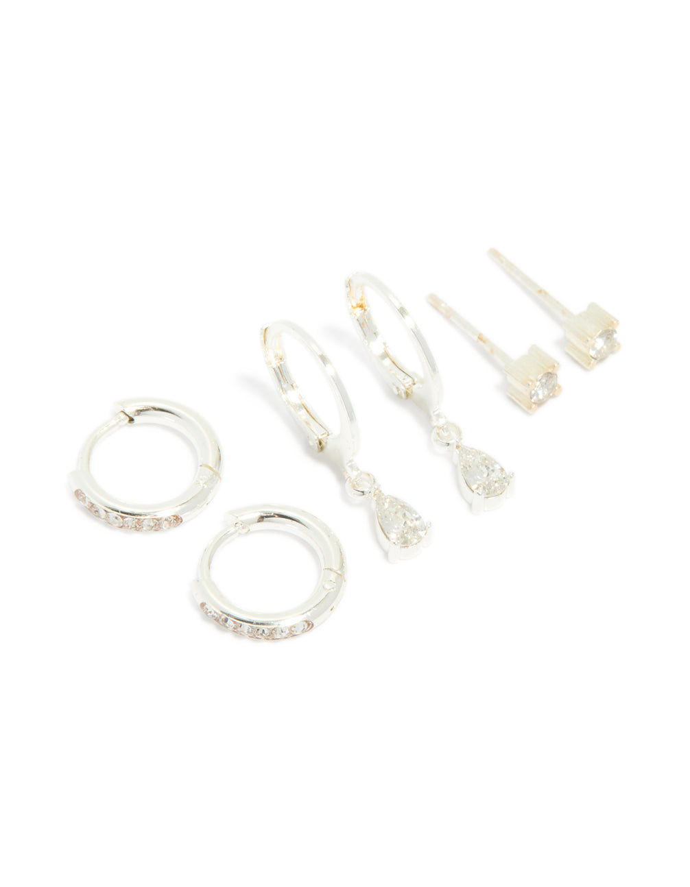 Featuring waterproof stainless steel cubic zirconia simple stud and huggie earrings in a 3-pack and silver finish front view