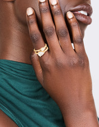 Featuring a gold plated double cubic zirconia split ring on finger view - link has visual effect only