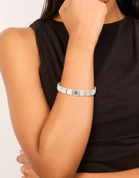Showcasing a waterproof stainless steel stretch watch link bracelet in silver on wrist view - link has visual effect only
