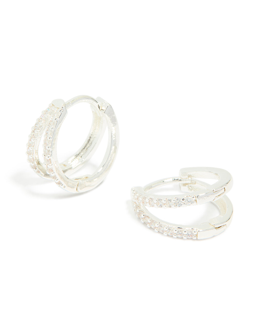 Presenting dainty silver plated cubic zirconia double layered small earrings with huggie closure front view