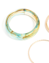 Showcasing marble pattern bangles in gold and light blue in a 3-pack close up view - link has visual effect only