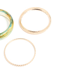 Showcasing marble pattern bangles in gold and light blue in a 3-pack close up view - link has visual effect only