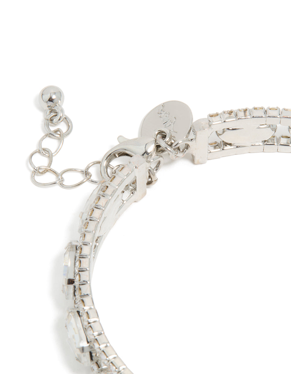 Designed with silver diamante shiny bracelet featuring oval stone cut in closure detail view
