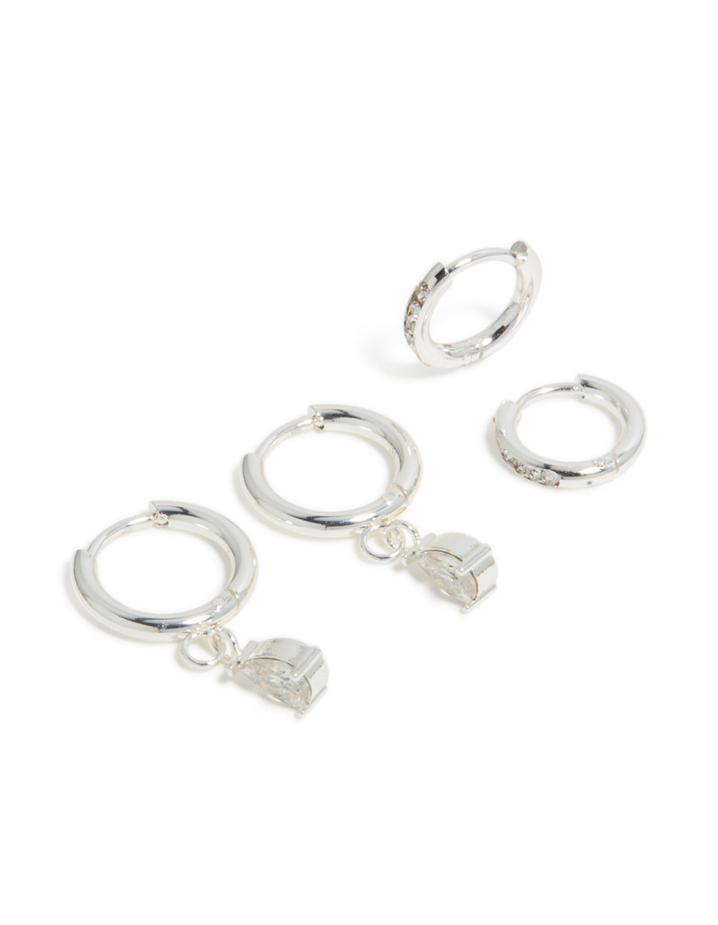 Crafted from waterproof stainless steel cubic zirconia pear and huggie earrings in a 2-in silver front view