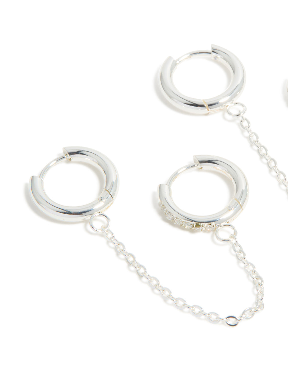 Designed with waterproof stainless steel cubic zirconia chain link huggie earrings in a 2-pack silver finish close up view