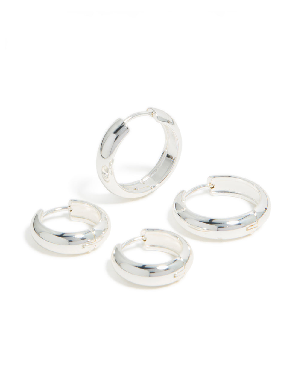 Crafted from waterproof stainless steel, these thick, large and mini hoop earrings in a 2-pack feature chunky round design in silver with a front view