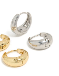 Crafted from waterproof mixed metal plated stainless steel tapered mini huggie earrings 2-pack featuring gold and silver post detail - link has visual effect only