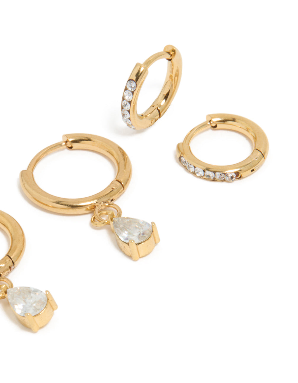 Detailed view of waterproof gold plated stainless steel huggie earrings with pear cut cubic zirconia 2-pack post detail view