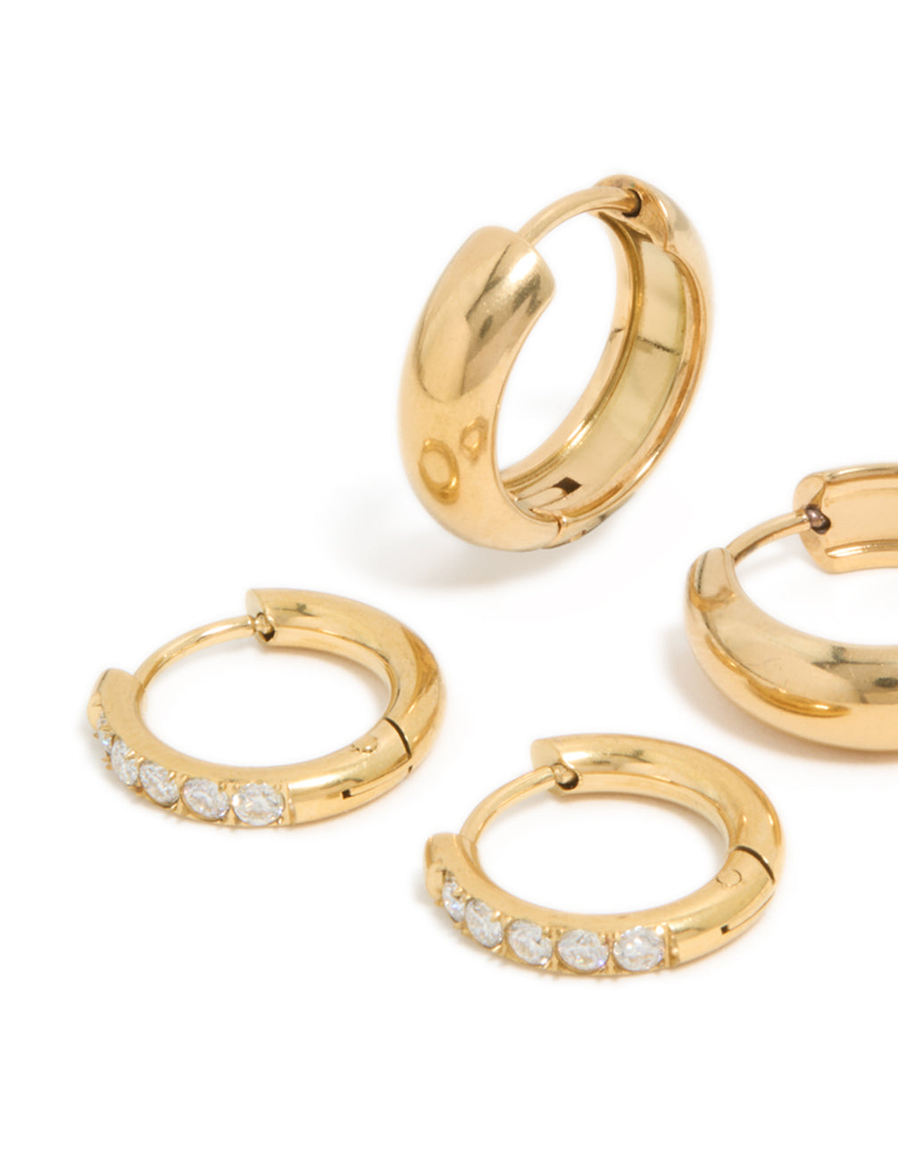 Stunning waterproof gold plated stainless steel cubic zirconia chubby huggie earrings in a 2-pack with chunky styling and crystal stones with a close up view