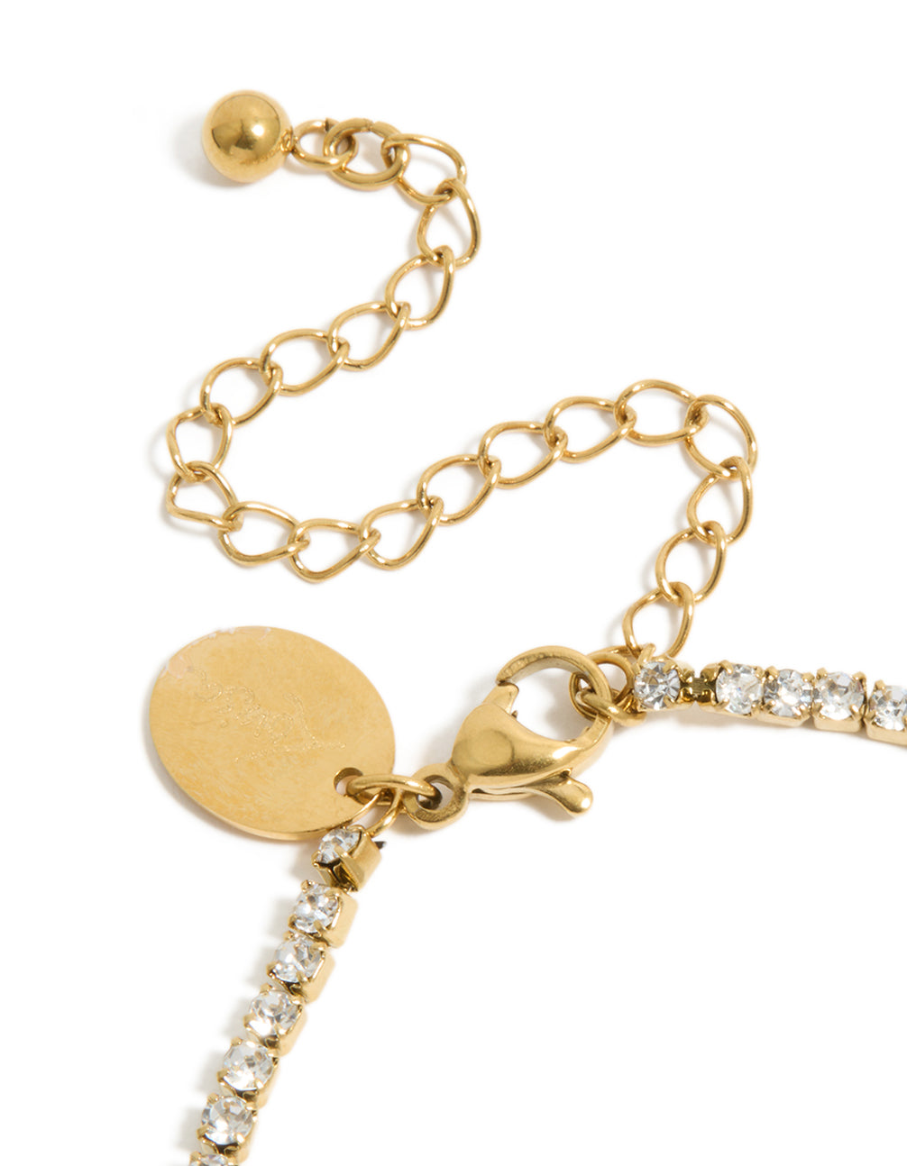 Designed with waterproof gold plated stainless steel cubic zirconia tennis letter L bracelet featuring initials in dainty statement style closure detail view