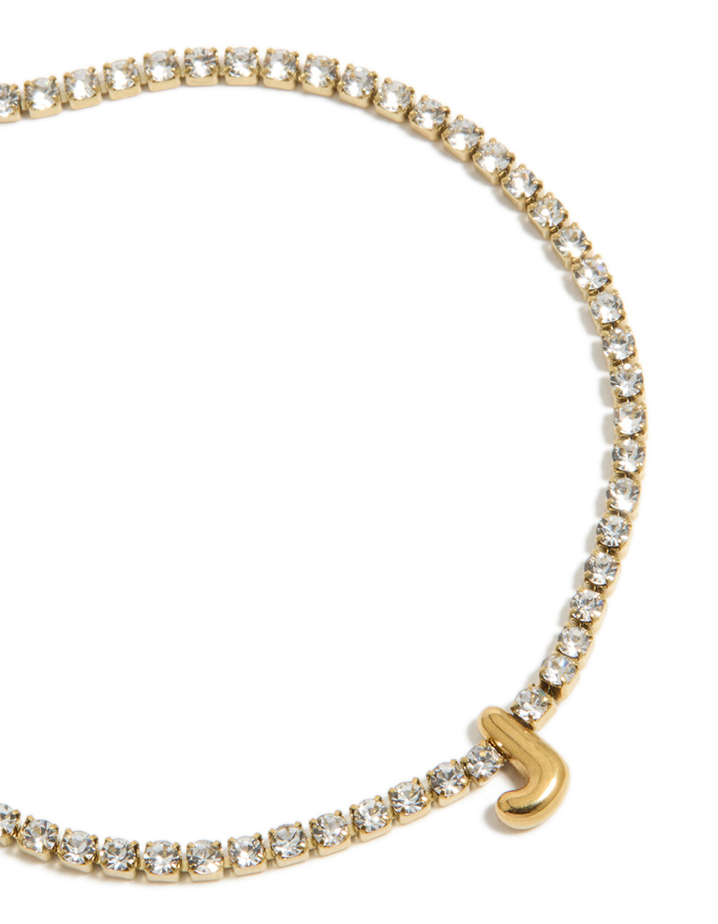 Detailed view of waterproof gold plated stainless steel tennis bracelet showcasing cubic zirconia settings and letter J initial in close up view