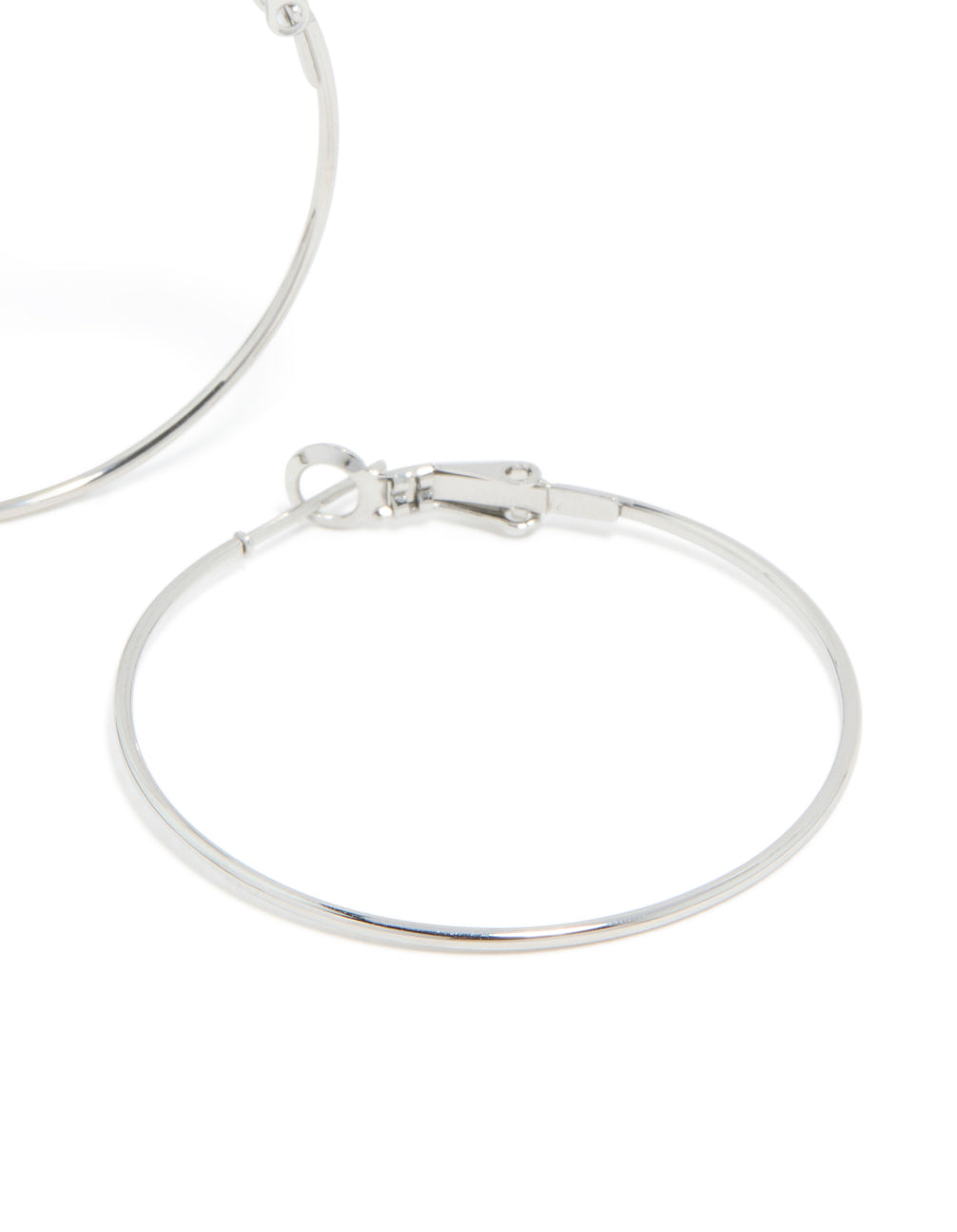 Displaying surgical steel 40 MM fine hoop earrings in statement silver finish post detail view