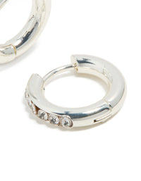 Highlighting the clicker closure detail of waterproof stainless steel round diamante hoop earrings in silver post detail view - link has visual effect only
