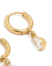 Designed with waterproof gold plated stainless steel are these dainty pear cut cubic zirconia charm huggie earrings post detail view - link has visual effect only