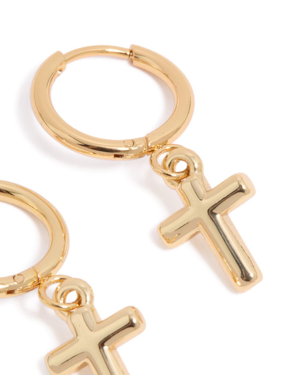 Highlighting cross feature huggie earrings crafted in waterproof gold plated stainless steel close up view