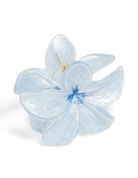 Presenting a light blue clear edge frangipani flower claw clip with floral design side view - link has visual effect only