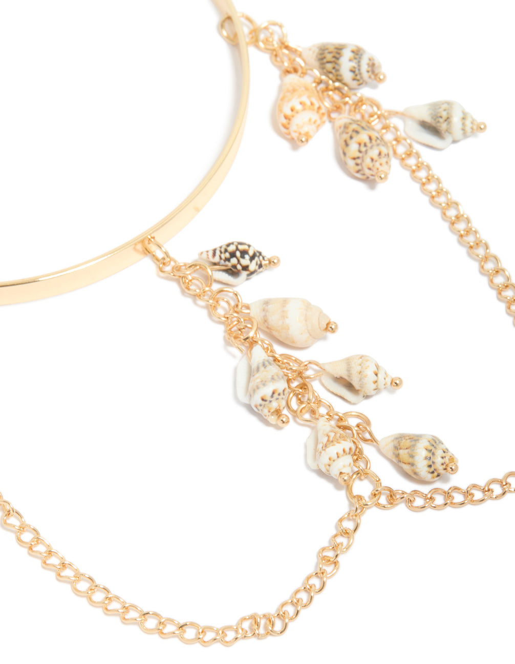 Crafted from gold with chain and ocean-inspired shell charms in seashell tones in close up view