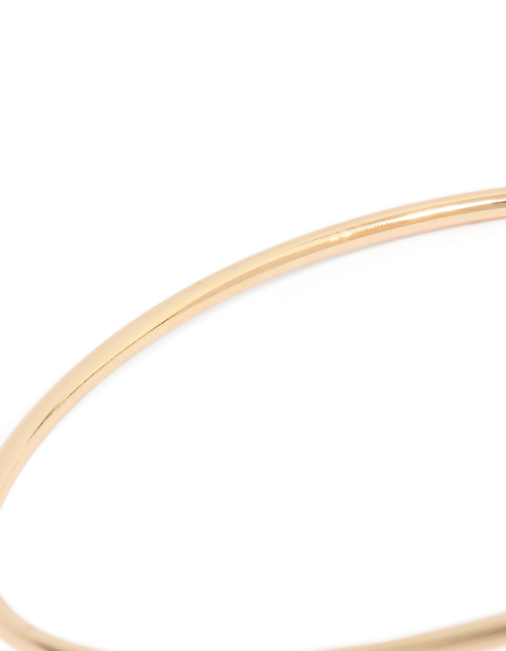 Crafted from enamel, this statement arm cuff with light pink floral design in gold close up view