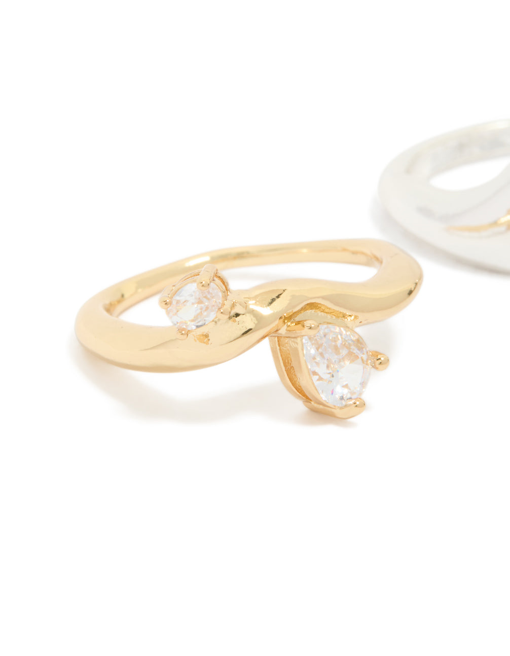 Designed with gold and silver tones, this cubic zirconia chunky wave ring set close up view