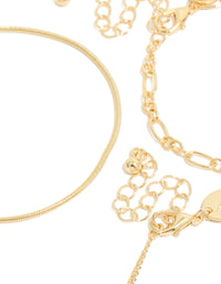 Featuring gold plated featuring cubic zirconia and chain bracelets in a 3-pack closure detail view - link has visual effect only
