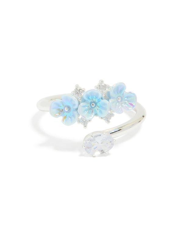 Featuring a silver plated triple flower wrap ring in powder blue and clear statement design front view