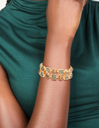 Featuring a gold brown acrylic and diamante stretch bracelet on wrist view - link has visual effect only