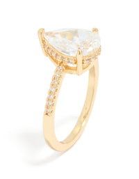 Elegant statement ring crafted from gold plated crystal featuring solitaire pear cubic zirconia side detail view - link has visual effect only
