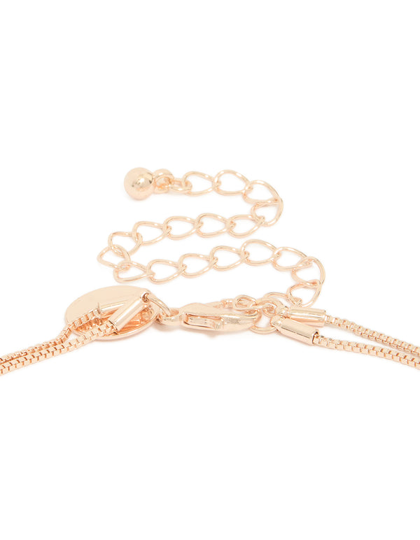 Displaying rose gold plated double layered necklace with cubic zirconia and pearl clasp detail view