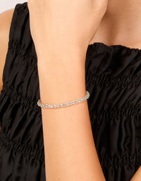 Featuring a rose gold plated diamante fireball bracelet on wrist view - link has visual effect only