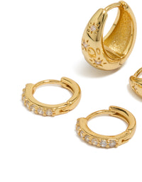 Crafted from brass, these dainty style gold plated huggie earrings in a 2-pack feature celestial star and teardrop designs with fine cubic zirconia crystal detailing close up view - link has visual effect only