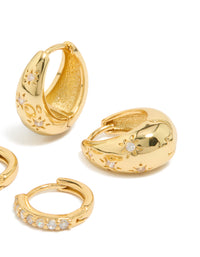 Designed with dainty styling, this 2-pack of gold plated brass huggie earrings features celestial star and teardrop elements adorned with fine cubic zirconia crystals front view - link has visual effect only