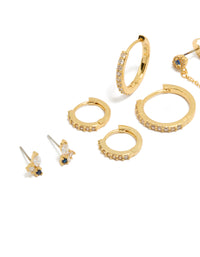 Explore gold plated brass blue cubic zirconia evil eye chain and huggie earrings 4-pack featuring crystal embellishments close up view - link has visual effect only