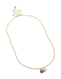 Highlighting a gold plated brass necklace with evil eye charm and pearl pendant front view - link has visual effect only