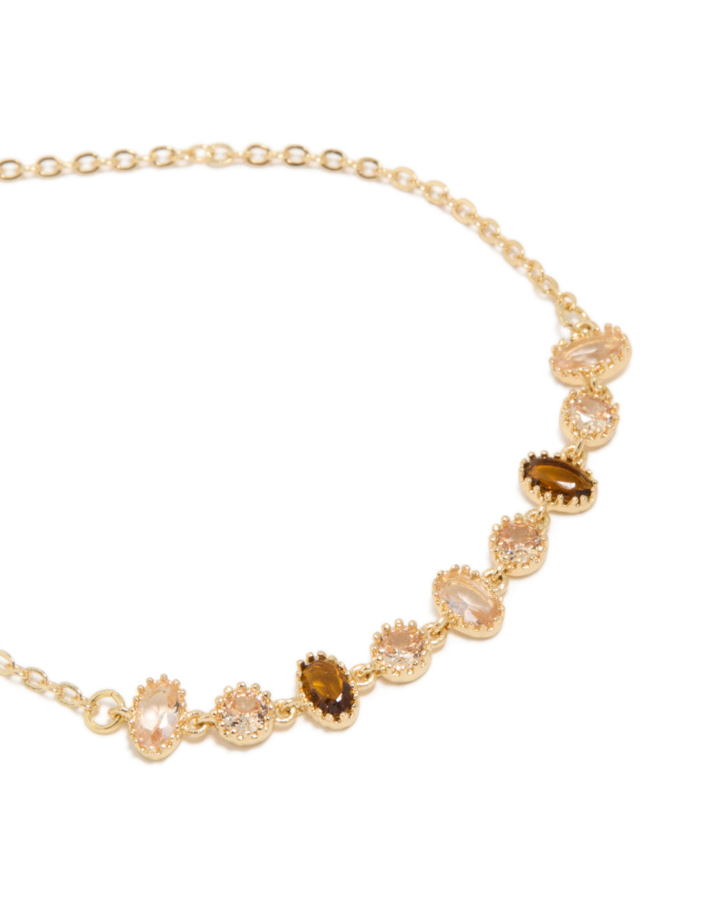 Elegant gold plated bracelet featuring cubic zirconia oval and round stone close up view
